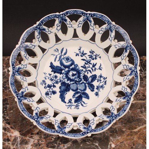 163 - A Worcester Pine Cone pattern shaped circular basket, printed in underglaze blue with peony between ... 