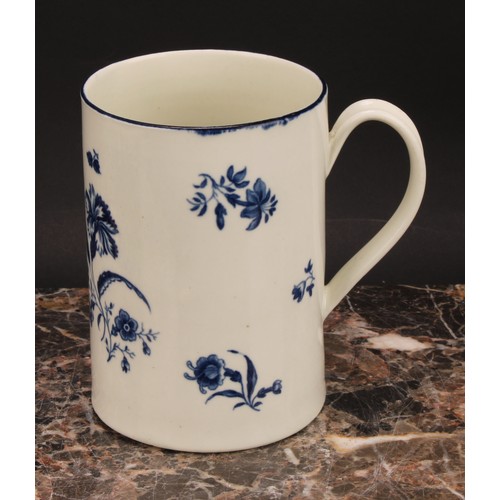 166 - A Worcester The Gilliflower pattern cylindrical mug, decorated in underglaze blue with cornflower sp... 