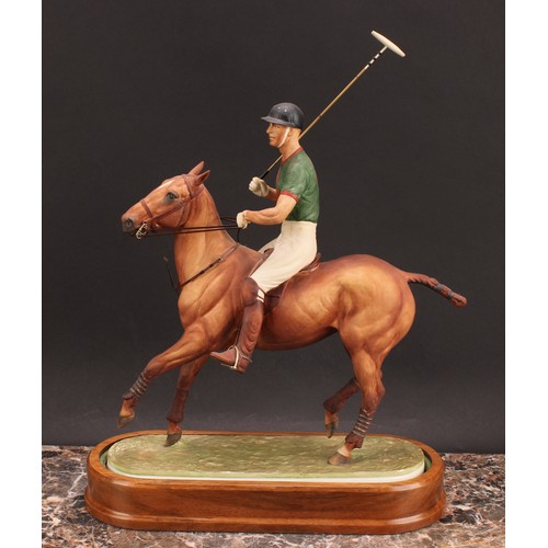 132 - A Royal Worcester equestrian figure, H.R.H The Duke of Edinburgh, playing polo, limited edition no.5... 