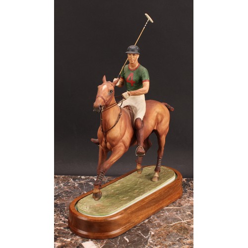 132 - A Royal Worcester equestrian figure, H.R.H The Duke of Edinburgh, playing polo, limited edition no.5... 