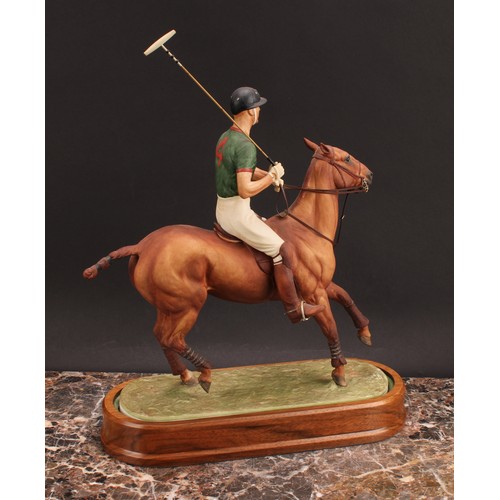 132 - A Royal Worcester equestrian figure, H.R.H The Duke of Edinburgh, playing polo, limited edition no.5... 