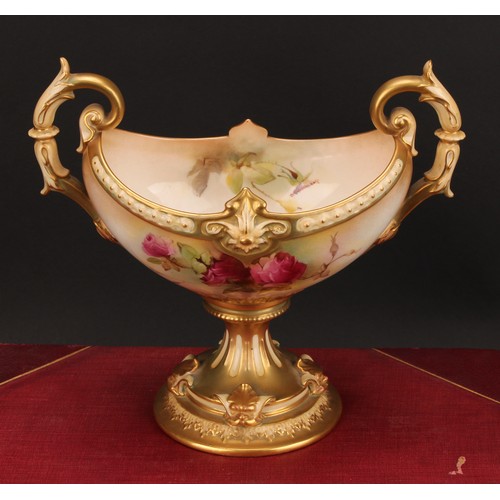 127 - A Royal Worcester boat shaped pedestal vase, painted by K Austin, signed, with roses, on a blush ivo... 