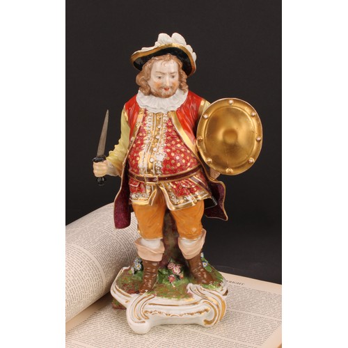 173 - A Derby figure, Quinn as Sir John Falstaff, he stands holding an oval shield and sword, wearing a br... 