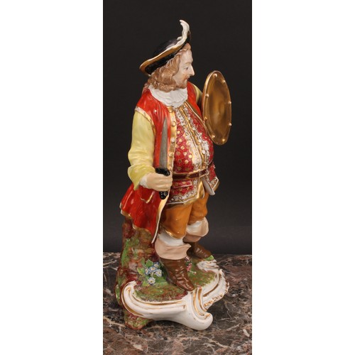 173 - A Derby figure, Quinn as Sir John Falstaff, he stands holding an oval shield and sword, wearing a br... 