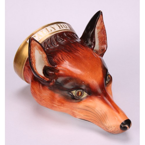 191 - An English porcelain novelty stirrup cup, possibly Derby, modelled as a fox mask, naturalistically p... 