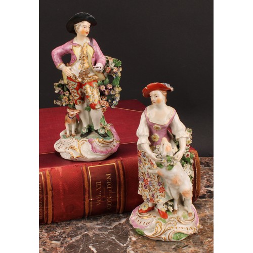 183 - A pair of Derby figures, The Garland Shepherds, he wearing a broad brimmed black hat, pink jacket, o... 