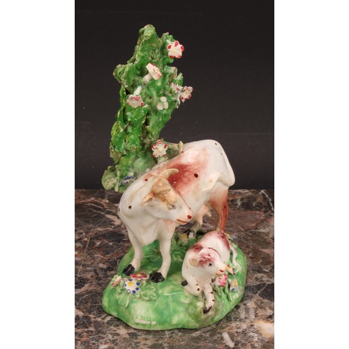 174 - A Derby model, of a cow and her calf, beside a tree, 15cm high, c.1815; others similar (3)