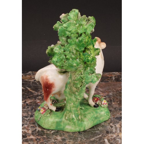 174 - A Derby model, of a cow and her calf, beside a tree, 15cm high, c.1815; others similar (3)