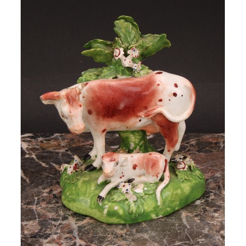 174 - A Derby model, of a cow and her calf, beside a tree, 15cm high, c.1815; others similar (3)