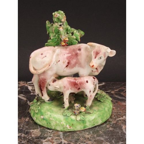 174 - A Derby model, of a cow and her calf, beside a tree, 15cm high, c.1815; others similar (3)