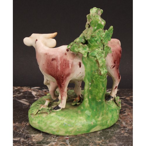 174 - A Derby model, of a cow and her calf, beside a tree, 15cm high, c.1815; others similar (3)