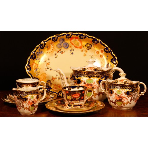 227 - A Royal Crown Derby Imari 3788 pattern teapot, sucrier and cover, milk jug, registration number 2048... 