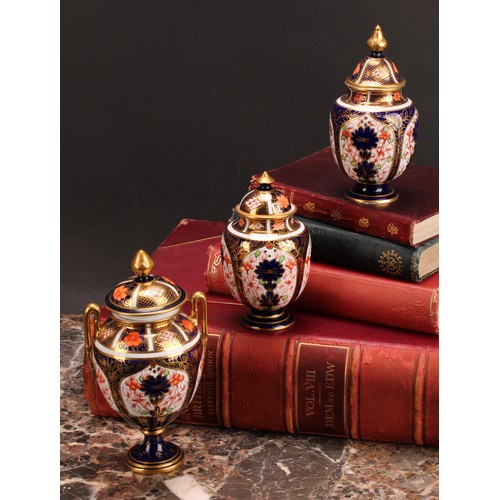 220 - A Royal Crown Derby 1128 Imari pattern two-handled ovoid pedestal vase, matched domed cover, circula... 