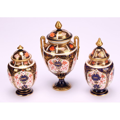 220 - A Royal Crown Derby 1128 Imari pattern two-handled ovoid pedestal vase, matched domed cover, circula... 