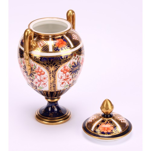 220 - A Royal Crown Derby 1128 Imari pattern two-handled ovoid pedestal vase, matched domed cover, circula... 