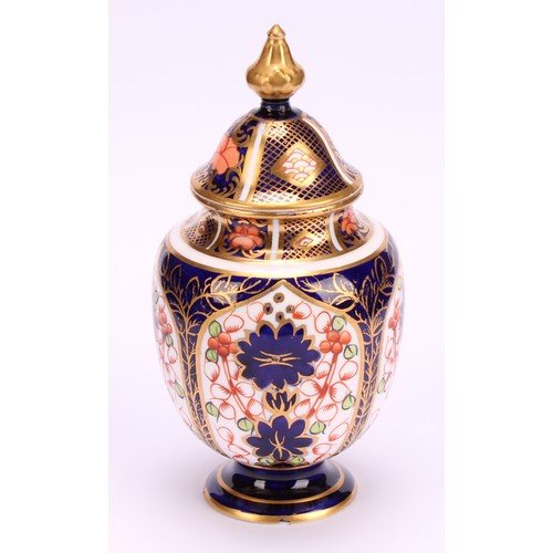 220 - A Royal Crown Derby 1128 Imari pattern two-handled ovoid pedestal vase, matched domed cover, circula... 