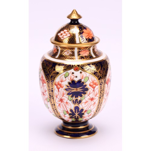 220 - A Royal Crown Derby 1128 Imari pattern two-handled ovoid pedestal vase, matched domed cover, circula... 