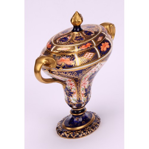 206 - A Royal Crown Derby 1128 Imari pattern flattened campana shaped two-handled vase and cover, oval sli... 