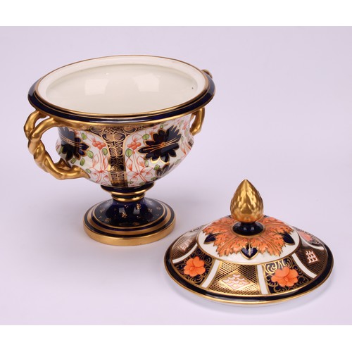 218 - A Royal Crown Derby 1128 Imari pattern two-handled campana shaped vase and cover, naturalistically m... 