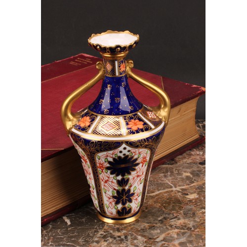 210 - A Royal Crown Derby 1128 Imari pattern ogee shaped two-handled vase, of slender form, foliate moulde... 