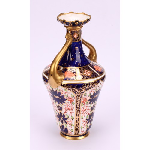 210 - A Royal Crown Derby 1128 Imari pattern ogee shaped two-handled vase, of slender form, foliate moulde... 