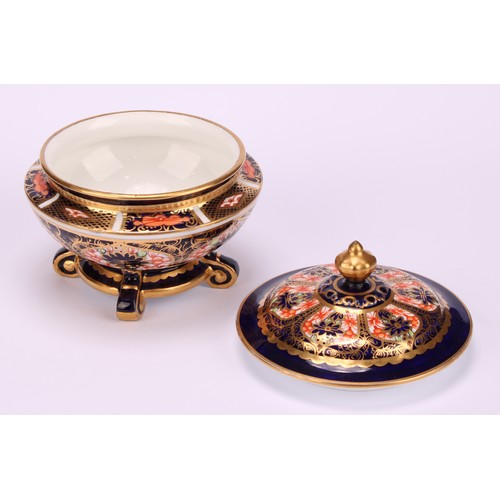 237 - An associated pair of Royal Crown Derby 1128 Imari pattern campana shaped boxes and covers, of compr... 