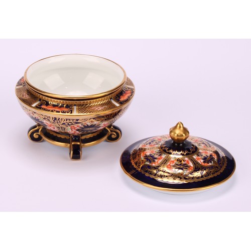 236 - An associated pair of Royal Crown Derby 1128 Imari pattern campana shaped boxes and covers, of compr... 