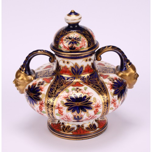 202 - A pair of Royal Crown Derby Imari pattern compressed ovoid two-handled pedestal vases, domed covers,... 