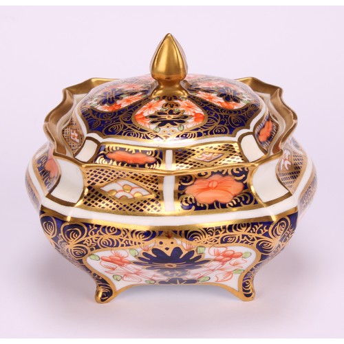 244 - An associated pair of Royal Crown Derby 1128 Imari pattern shaped square boxes and covers, of lobed ... 