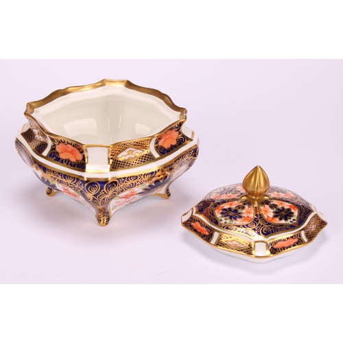 244 - An associated pair of Royal Crown Derby 1128 Imari pattern shaped square boxes and covers, of lobed ... 