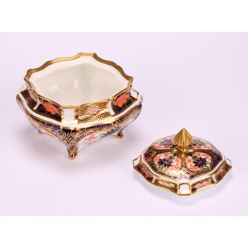 244 - An associated pair of Royal Crown Derby 1128 Imari pattern shaped square boxes and covers, of lobed ... 