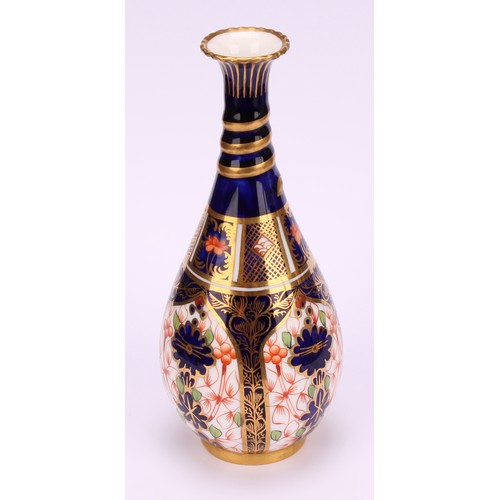 196 - A pair of Royal Crown Derby 1128 Imari pattern ovoid bottle vases, the slender necks moulded with sp... 