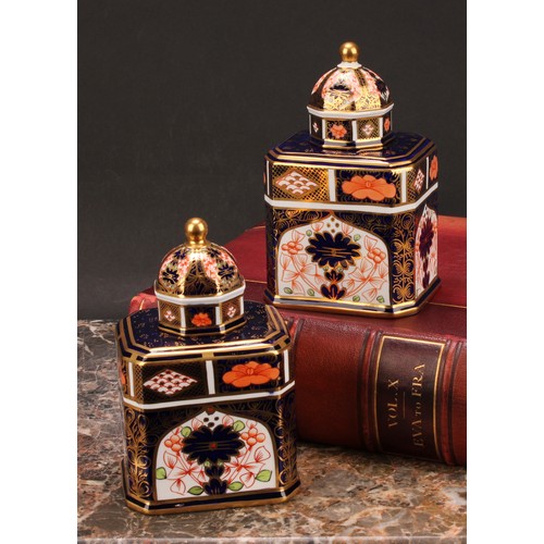 238 - An associated pair of Royal Crown Derby 1128 Imari pattern canted rectangular tea caddies, domed oct... 