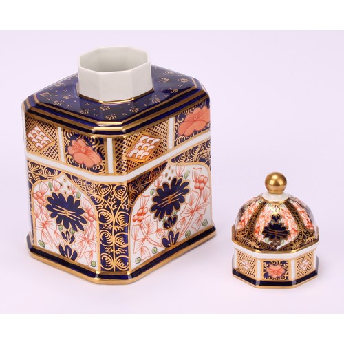 238 - An associated pair of Royal Crown Derby 1128 Imari pattern canted rectangular tea caddies, domed oct... 