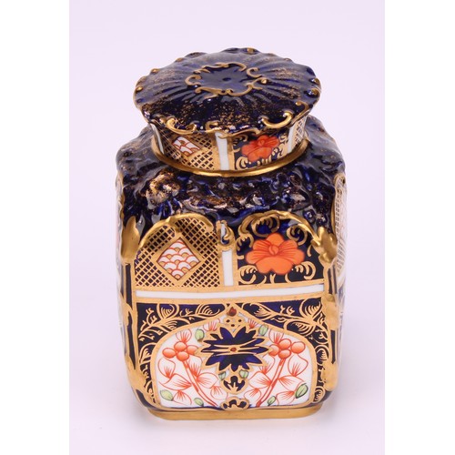 235 - A set of three Royal Crown Derby 1128 pattern shaped rectangular caddies, shaped circular covers, 10... 