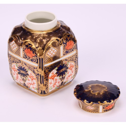 235 - A set of three Royal Crown Derby 1128 pattern shaped rectangular caddies, shaped circular covers, 10... 