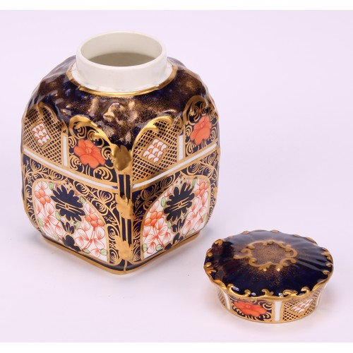 235 - A set of three Royal Crown Derby 1128 pattern shaped rectangular caddies, shaped circular covers, 10... 