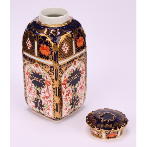 235 - A set of three Royal Crown Derby 1128 pattern shaped rectangular caddies, shaped circular covers, 10... 