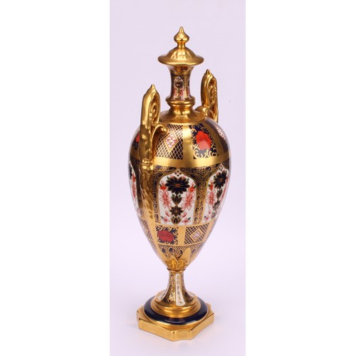 226 - A Royal Crown Derby Imari 1128 pattern two handled pedestal vase and cover, solid gold band, first q... 