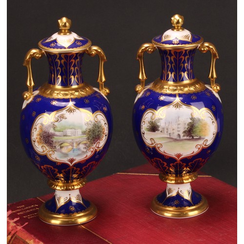 203 - A pair of Royal Crown Derby pedestal ovoid two handled vases and covers, The Chatsworth Vase and The... 