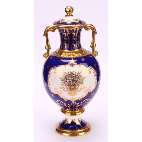 203 - A pair of Royal Crown Derby pedestal ovoid two handled vases and covers, The Chatsworth Vase and The... 