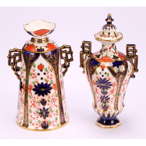 228 - A Royal Crown Derby Imari elongated ogee shaped two-handled vase and cover, Japanesque angular handl... 