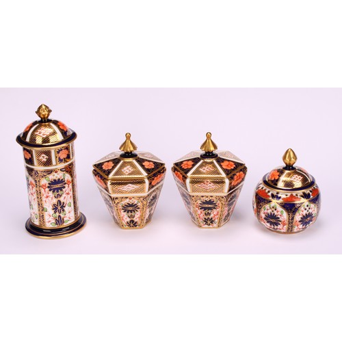 245 - An associated pair of Royal Crown Derby 1128 Imari pattern tapered hexagonal jars and covers, 10cm h... 