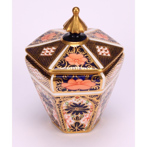 245 - An associated pair of Royal Crown Derby 1128 Imari pattern tapered hexagonal jars and covers, 10cm h... 