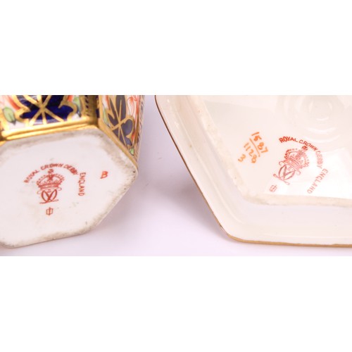 245 - An associated pair of Royal Crown Derby 1128 Imari pattern tapered hexagonal jars and covers, 10cm h... 