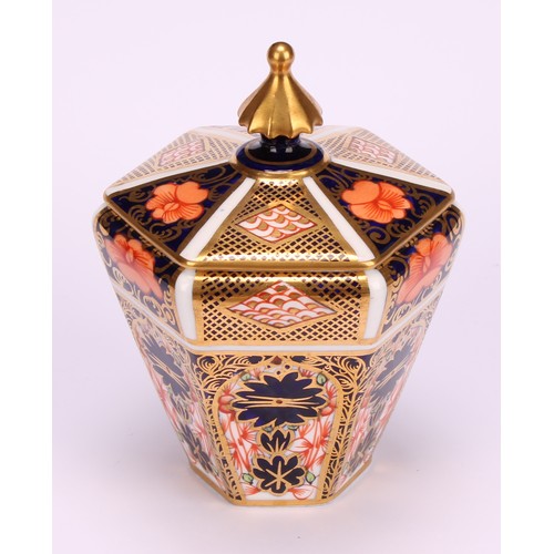 245 - An associated pair of Royal Crown Derby 1128 Imari pattern tapered hexagonal jars and covers, 10cm h... 