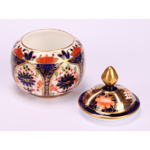 245 - An associated pair of Royal Crown Derby 1128 Imari pattern tapered hexagonal jars and covers, 10cm h... 