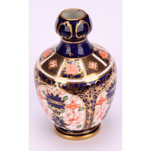 217 - A Royal Crown Derby 1128 Imari pattern two-handled bottle vase, of conical form, swan neck handles, ... 