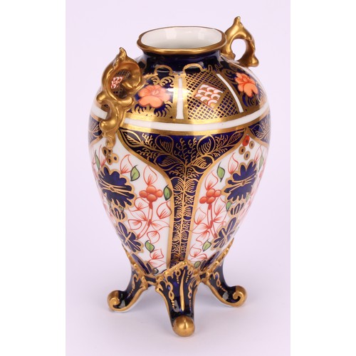 207 - A Royal Crown Derby 1128 Imari pattern flattened ovoid two-handled vase, rococo style handles, four ... 