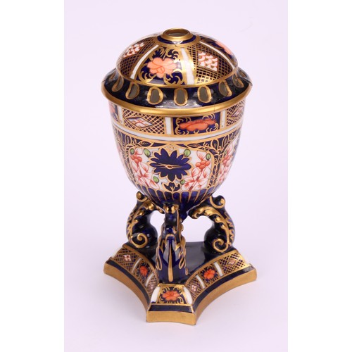 207 - A Royal Crown Derby 1128 Imari pattern flattened ovoid two-handled vase, rococo style handles, four ... 